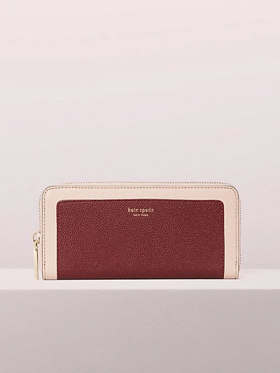 Shop Kate Spade Margaux Slim Continental Wallet In Tamarillo