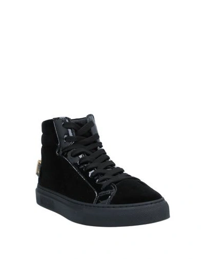 Shop Moschino Sneakers In Black