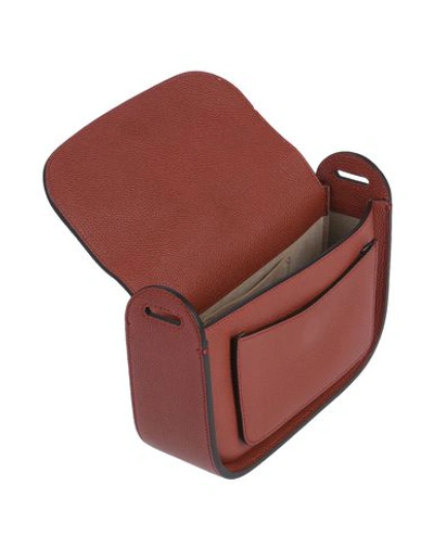 Shop Giorgio Armani Cross-body Bags In Brick Red