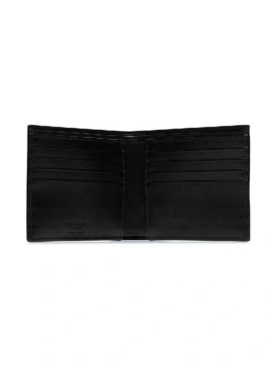 Shop Saint Laurent Star Print Bi-fold Wallet In Black