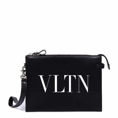 Shop Valentino Vltn Zipped Clutch Bag In Black