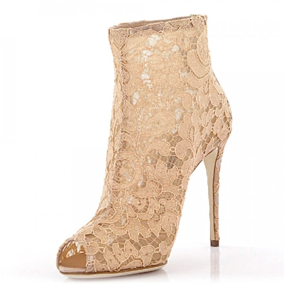 Shop Dolce & Gabbana Ankle Boots Beige