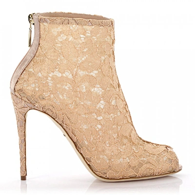 Shop Dolce & Gabbana Ankle Boots Beige