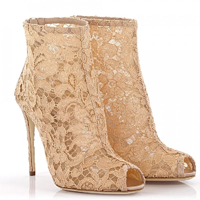 Shop Dolce & Gabbana Ankle Boots Beige