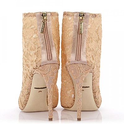 Shop Dolce & Gabbana Ankle Boots Beige