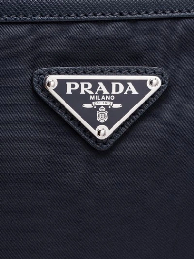 Shop Prada Logo Plaque Messenger Bag In Blue