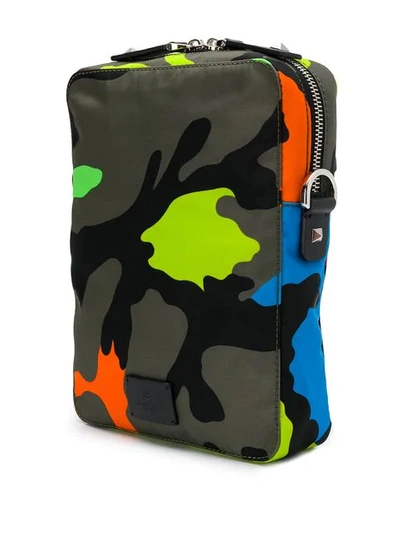 Shop Valentino Garavani Camouflage Print Messenger Bag In Green