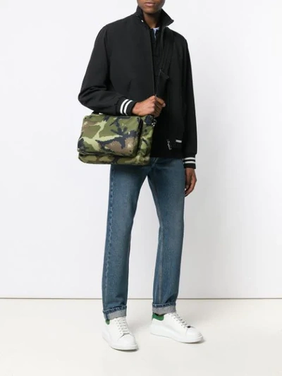 Shop Valentino Rockstud Camouflage Print Cross Body Bag In Green