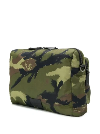 Shop Valentino Rockstud Camouflage Print Cross Body Bag In Green