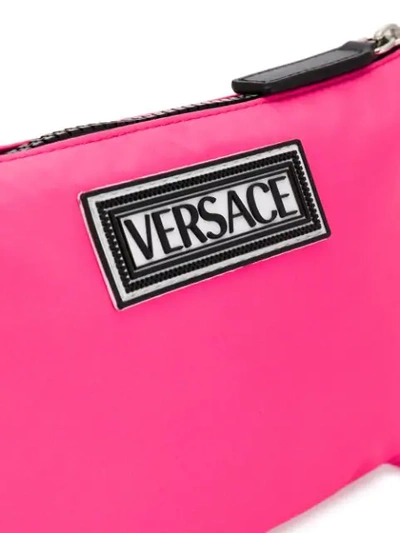Shop Versace Logo Print Pouch In Pink