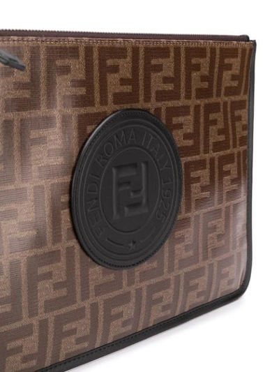 Shop Fendi Ff Motif Zipped Clutch In Brown