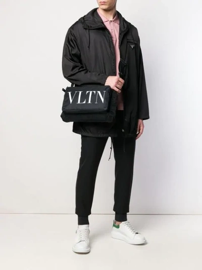 Shop Valentino Vltn Shoulder Bag In Black