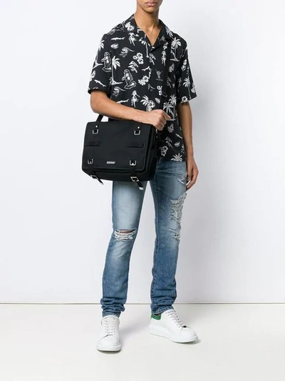Shop Saint Laurent Strap Detail Messenger Bag In Black