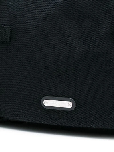 Shop Saint Laurent Strap Detail Messenger Bag In Black