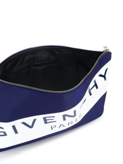 Shop Givenchy Logo Zipped Clutch In Blue