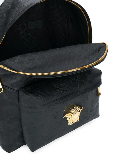 Shop Versace Embossed Medusa Head Backpack In Black
