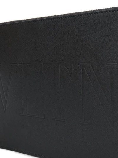 Shop Valentino Garavani Vltn Clutch In Black