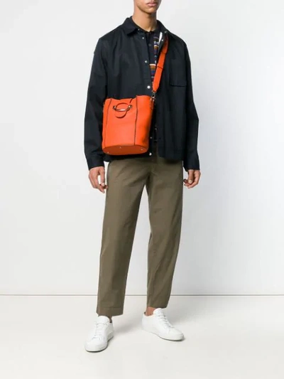 Shop Tod's Logo Bucket Bag In G806 Orange