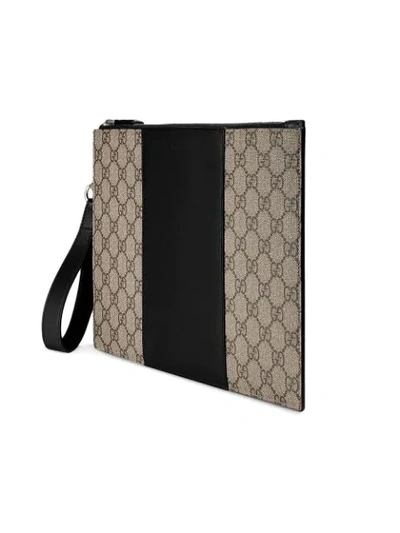 Shop Gucci Gg Supreme Pouch In Neutrals