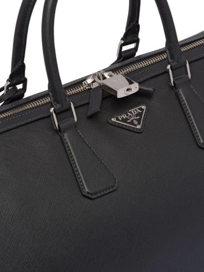 Shop Prada Logo Plaque Duffle Bag - Black