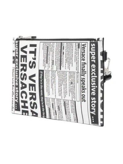 Shop Versace Tabloid Print Leather Pouch - Farfetch In Dwnrs