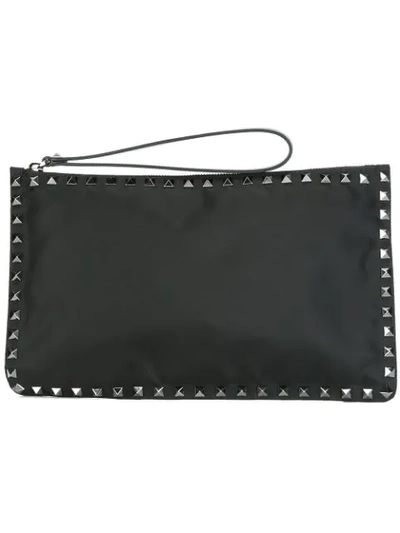 Shop Valentino Garavani Rockstud Clutch In Black