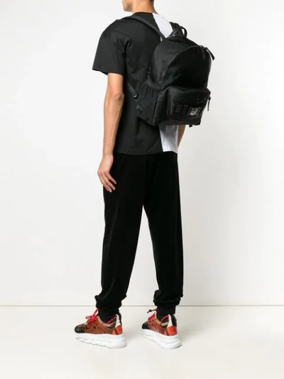Shop Versace Medusa Stud Backpack In Black