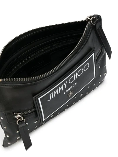 Shop Jimmy Choo Kimi Star Studded Messenger Bag In Black