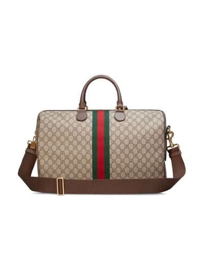 Shop Gucci Ophidia Gg Carry-on Bag - Neutrals