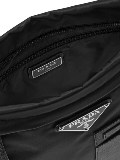 Shop Prada Logo Plaque Messenger Bag In Black