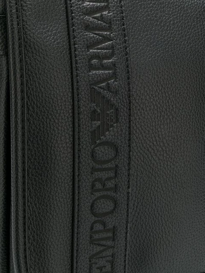 Shop Emporio Armani Embossed Logo Messenger Bag In Black