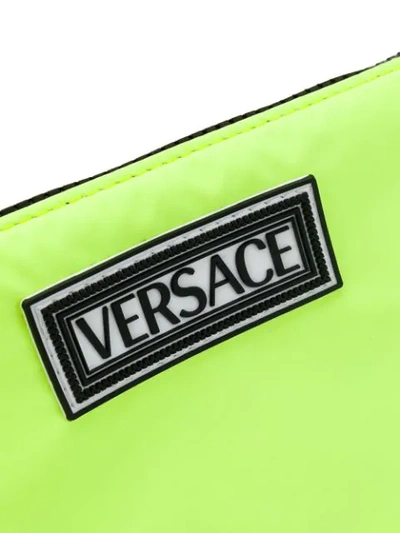 Shop Versace Logo Clutch In Yellow