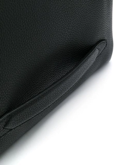 Shop Ferragamo Embossed Logo Clutch Bag In Black