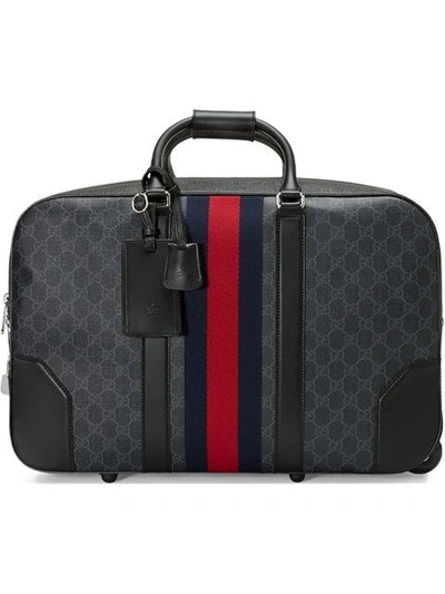 Shop Gucci Soft Gg Supreme Carry-on Duffle With Wheels In Black