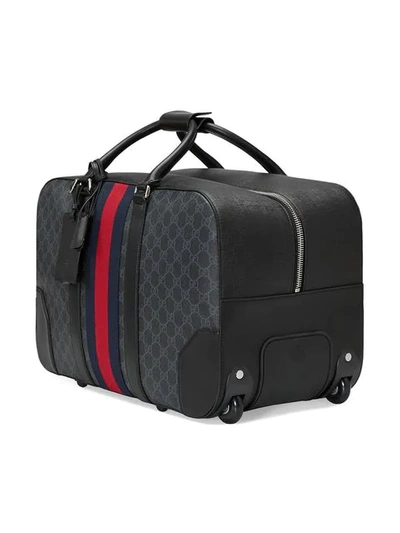 Shop Gucci Soft Gg Supreme Carry-on Duffle With Wheels In Black
