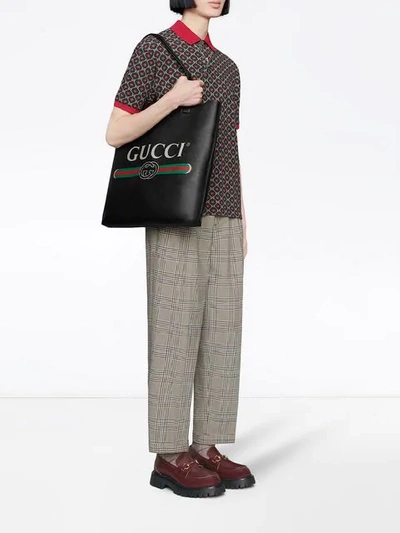 Shop Gucci Logo-print Leather Tote Bag In Black