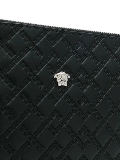 Shop Versace Greek Keys Embossed Pouch - Black