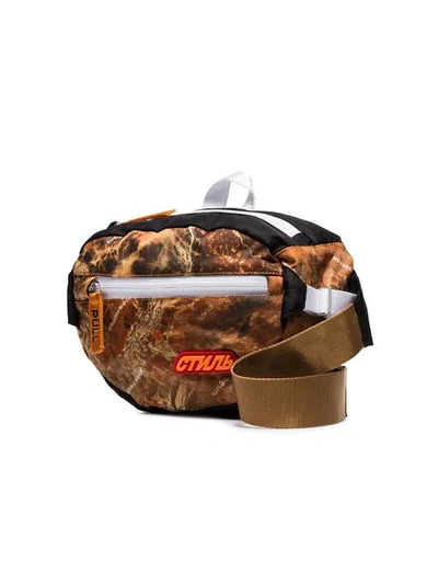 Shop Heron Preston Ctnmb Camouflage Print Padded Crossbody Bag In Brown