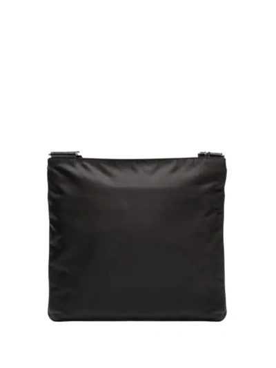 Shop Prada Logo-plaque Messenger Bag In Black