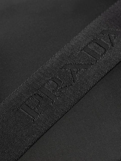 Shop Prada Logo-plaque Messenger Bag In Black