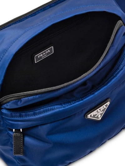 Shop Prada Logo Plaque Crossbody Bag In Blue