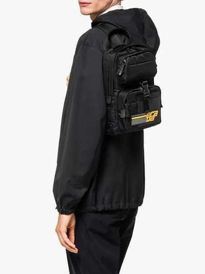 Shop Prada Logo Patch Saffiano Backpack In F0c2p Black/sunny Yellow