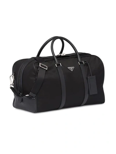 Shop Prada Saffiano Leather Trim Duffle Bag In Black