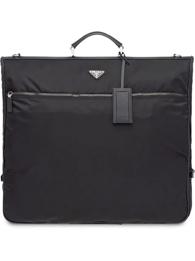 Shop Prada Saffiano Leather And Nylon Garment Bag In Black