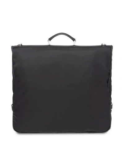 Shop Prada Saffiano Leather And Nylon Garment Bag In Black