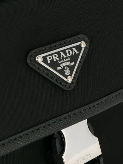 Shop Prada Logo Buckled Clutch In Black
