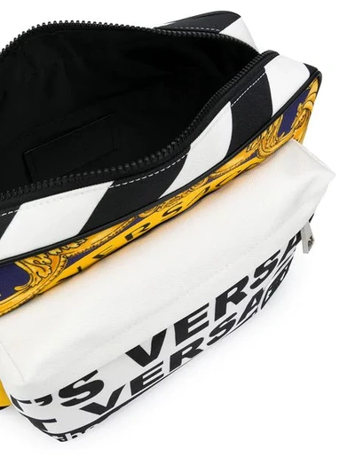 Shop Versace News Print Messenger Bag In White