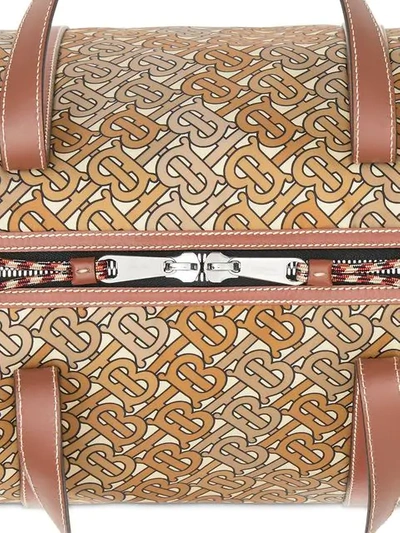 Shop Burberry Monogram Print Nylon And Leather Barrel Bag In Brown