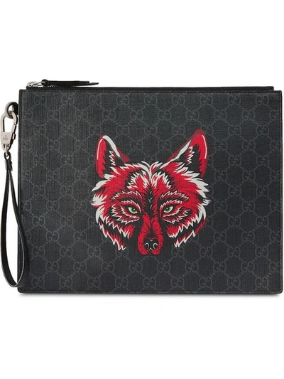 Shop Gucci Gg Supreme Pouch With Wolf In Black