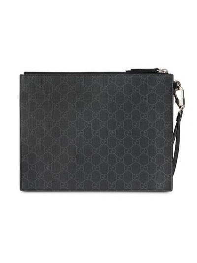 Shop Gucci Gg Supreme Pouch With Wolf In Black